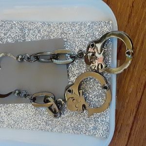 Final price- Hot topic handcuff skull earrings